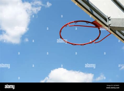 Basketball Hoop Aginst Blue Sky And White Clouds Stock Photo Alamy