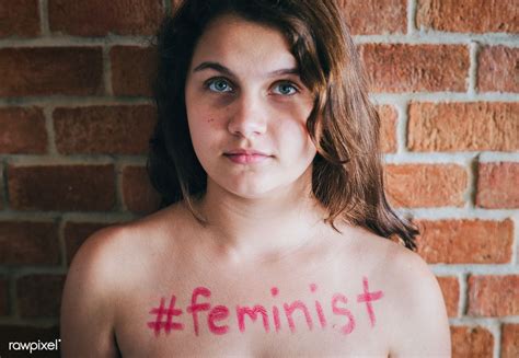 download premium image of girl with hashtag feminist written on her chest feminist writing