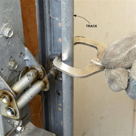 This could be the issue. How to Repair Garage Door Springs and Cables | Garage door ...