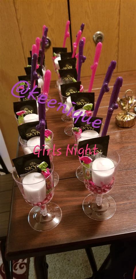 There Are Many Toothbrushes In Wine Glasses On The Table With Candles And Place Cards