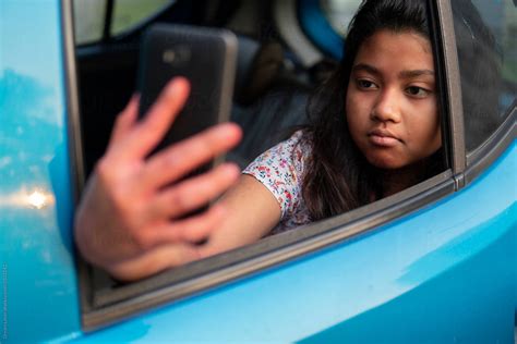 Teenage Girl Taking Selfie With Smart Phone By Dream Lover