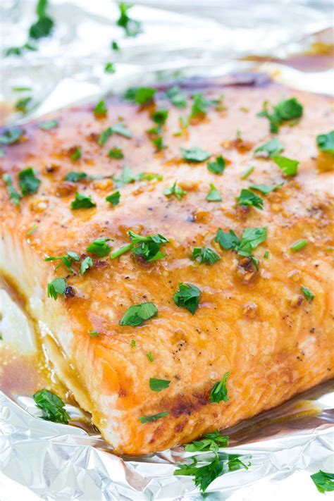 Sick of overcooking your salmon? The best easy oven baked salmon recipe! The salmon is ...