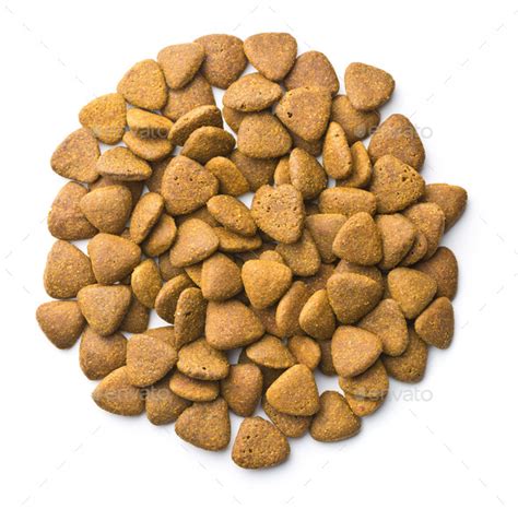 For puppies, pregnant, and nursing dogs, please refer to the recommended feeding amounts that are printed on the bag of dog. Dry kibble dog food. Stock Photo by jirkaejc | PhotoDune