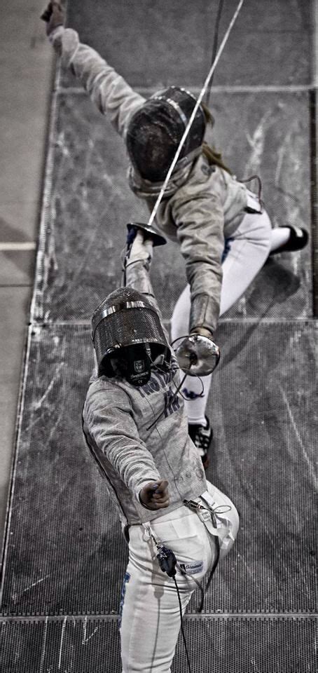 Overhead Action Shot Of Womens Sabre Left Handed Vs Right Handed