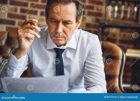 Concentrated Male Person Looking At Papers Stock Image Image Of
