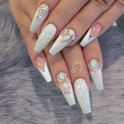 White Nail Designs With Rhinestones Add A Little Sparkle To Your Look