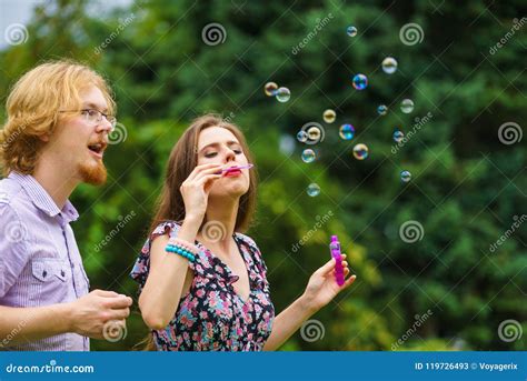 Couple Blowing Soap Bubbles Having Fun Stock Image Image Of Love Park 119726493