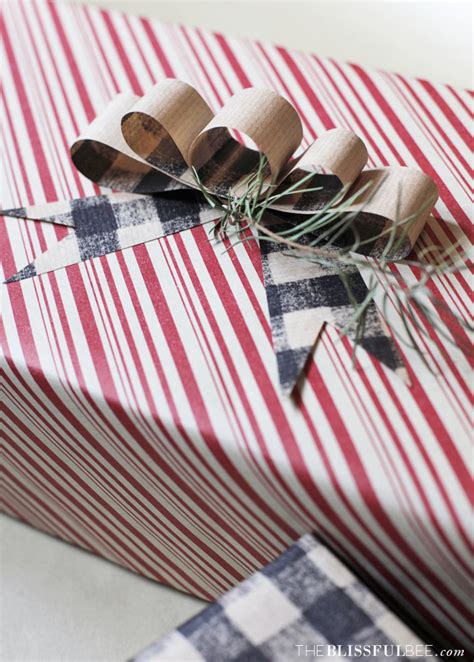 How to wrap a parcel using a button and twine. DIY Wrapping Paper Bow - THE BLISSFUL BEE
