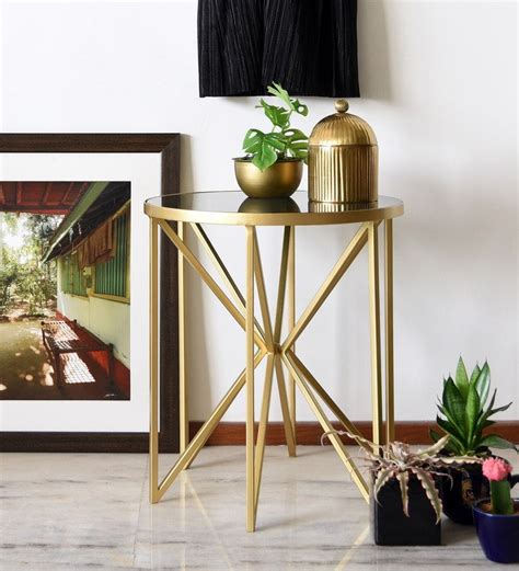 Available in 9 different colors. Buy Asterix Deco Metal Table in Gold with Black Glass Top ...