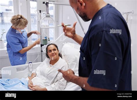 Female Patient Talking To Nurse Stock Photo Alamy