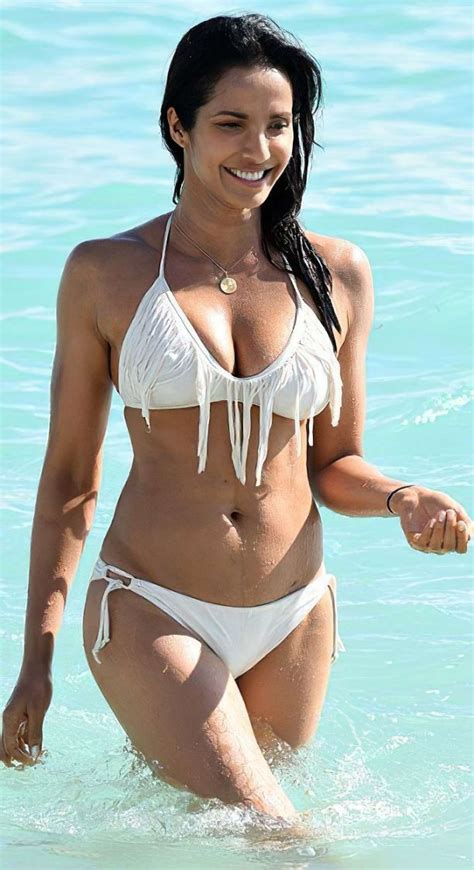 padma lakshmi in white bikini on the beach in miami gotceleb