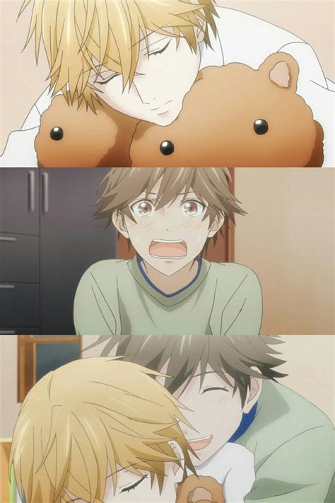 Two Anime Characters Laying On Top Of Each Other With Teddy Bears In