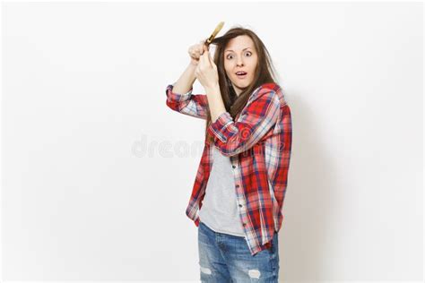 Young Crazy Loony Woman In Casual Clothes Winding Hair On Paint Brush