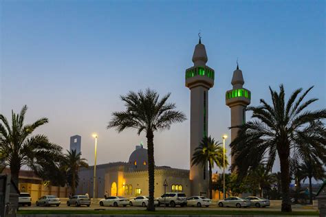 Men Slowly Trickle In To A Mosque In Abu Dhabi For Maghrib Prayer On