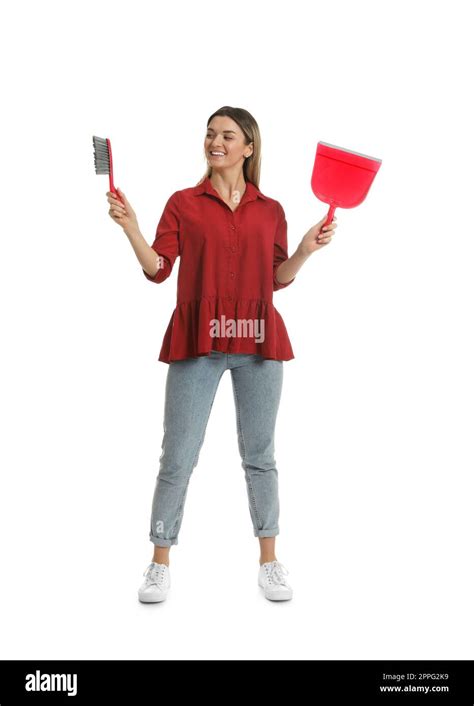 Young Woman With Broom And Dustpan On White Background Stock Photo Alamy
