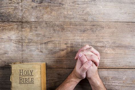 Bible And Praying Hands Stock Image Colourbox