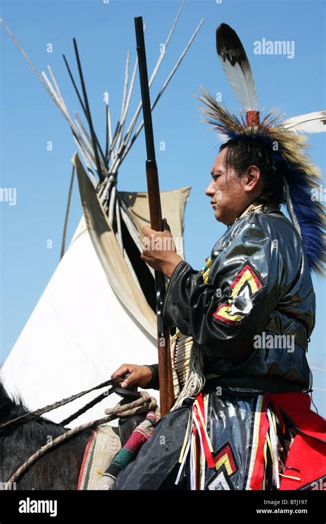 A Native American Indian On Horseback Next To A Tipi Stock Photo Alamy