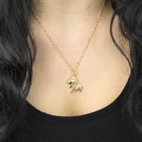 Gold plated jewelry is jewelry made of a base metal (e.g. Gold Plated Sterling Silver Fish Necklace By Martha Jackson Sterling Silver | notonthehighstreet.com