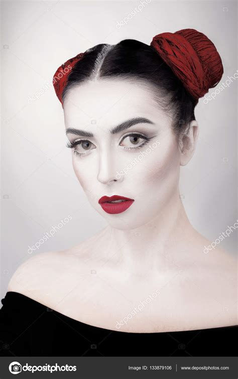 Portrait Of A Girl In A High Fashion Beauty Style With White Skin Red