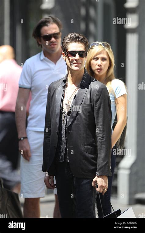 Janes Addiction Frontman Perry Farrell And His Wife Etty Lau Farrell Go Shopping In New York