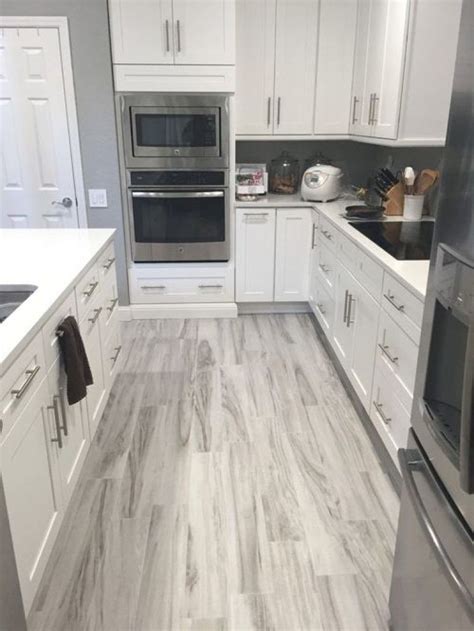 The color is emphasized by a beautiful shape that just note that all the tiles are the same color and the same gradient of grey. 30+ Gorgeous Grey And White Kitchen Design For Winter Season in 2020 (With images) | Grey ...