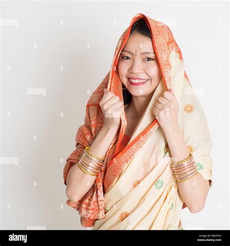 Portrait Of Indian Muslim Girl In Sari Covered Her Head Smiling