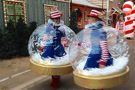 Inflatable Snow Globe Costumes Are A Hit At Rudolphs Holly Jolly