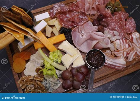 Assorted Matured Cheese And Cold Meat Cut Platter With Condiment Stock