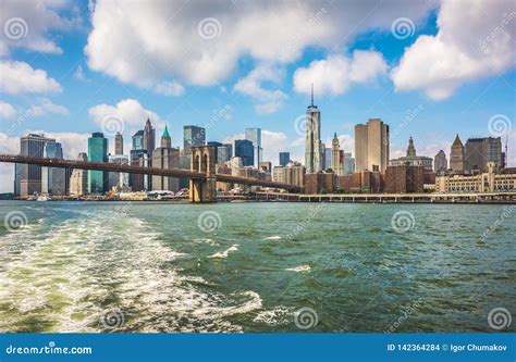 Manhattan View From The East River To The Brooklyn Bridge Stock Photo