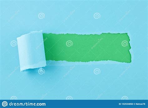 Torn Colored Paper Hole In The Sheet Of Paper Stock Photo Image Of