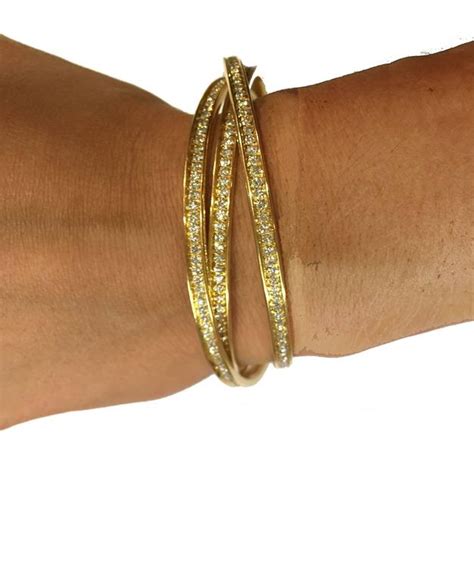 Shop with afterpay on eligible items. Cartier Trinity Diamond Gold Bracelet at 1stdibs