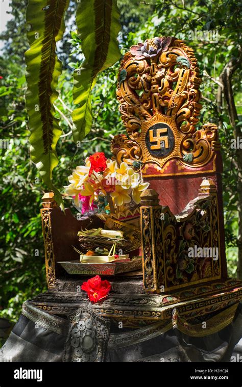 Indonesia Bali Ubud Swastika Symbol On Shrine With Offerings Stock