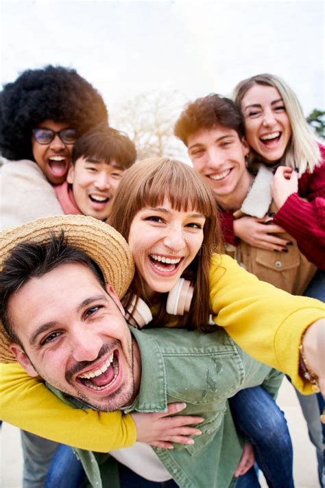 Vertical Photo Of Cheerful Group Of Happy Friends Taking Smiling Selfie