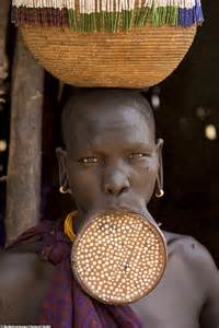Stunning Photos Reveal The Unique Beauty Of Ethiopias Much Feared Mursi Tribe Daily Mail Online