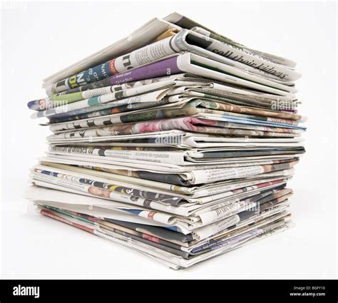 Stack Of Newspapers On A White Background Ready For Recycling Stock