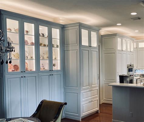 We are starting a remodel soon and need to replace all of our kitchen if it's going to be a nice remodel on a nice home. Traditional White Kitchen with Lots of Glass Doors - Traditional - Kitchen - Houston - by Bay ...