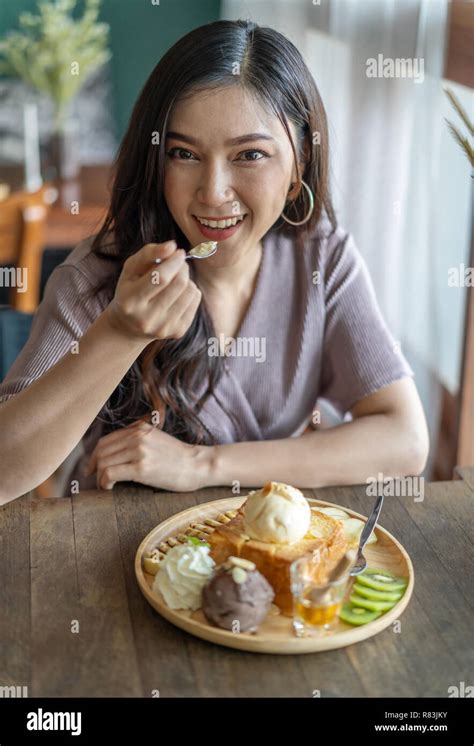 Chinese Woman Eating Banana Hi Res Stock Photography And Images Alamy