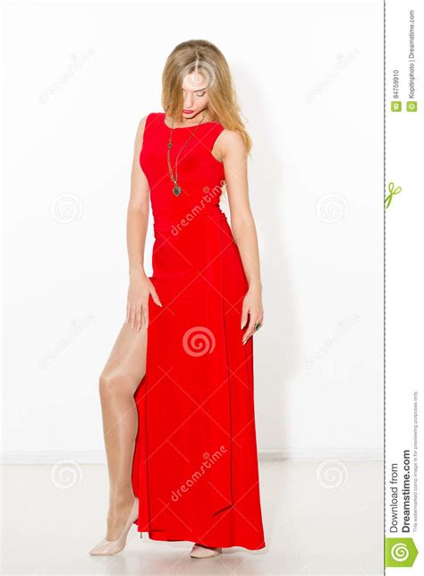 fashionable curly blonde with bright makeup sexual arousal girl in a short dress isolated on