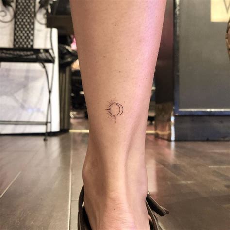 Minimalist Sun And Moon Tattoo