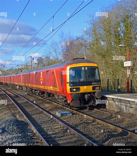 Royal Mail Class 325 Parcels Train At Speed Passing Oxenholme Rail