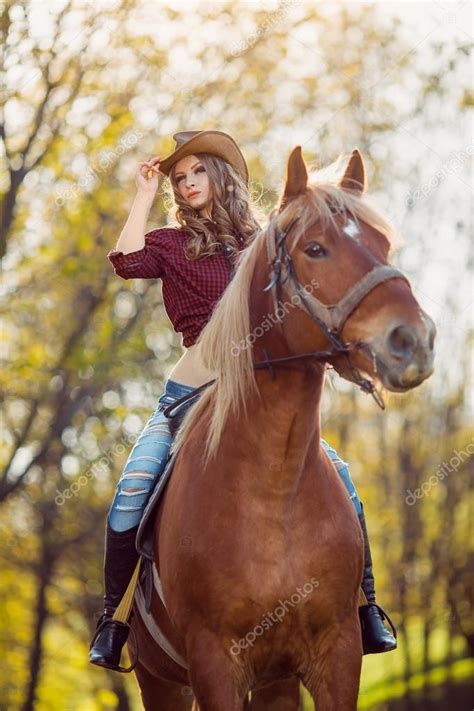 Beautiful Girl Riding Horse On Autumn Field ⬇ Stock Photo