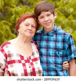 Granny Her Grandson Smiling Outdoors Looking Stock Photo 289939619