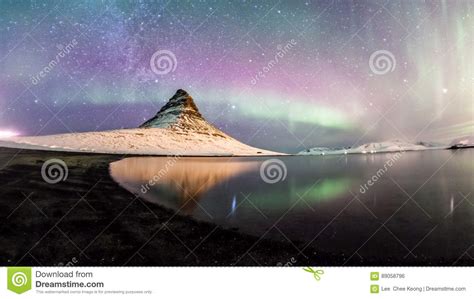 The Northern Lights And Winter Milky Way Over Kirkjufell Royalty Free