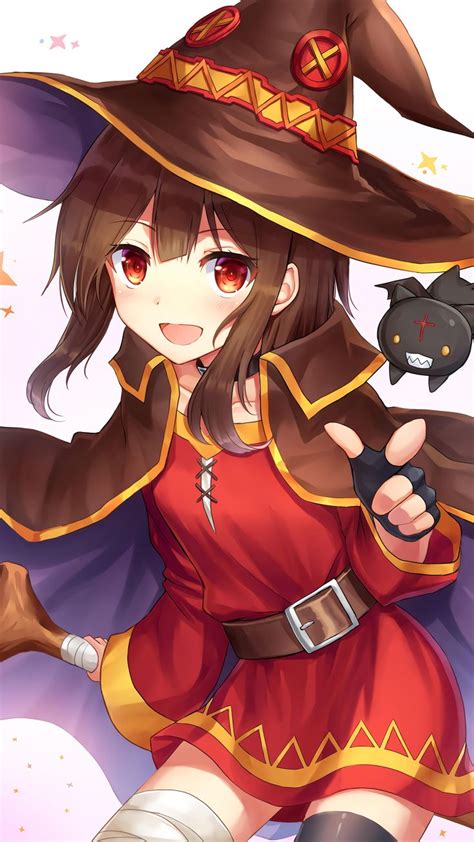 A Woman In A Witch Costume Holding A Black Cat And Pointing At