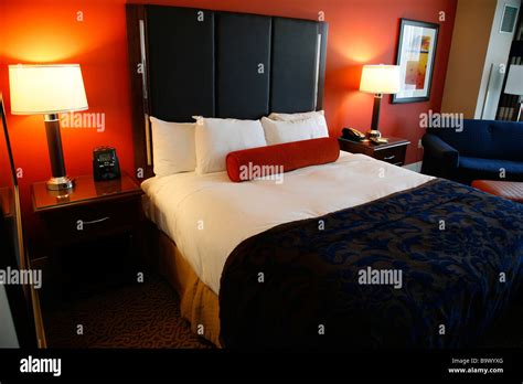 Generic Hotel Bed Room With Clean Freshly Made King Bed Stock Photo Alamy