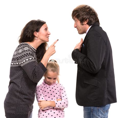 Sad Looking Girl With Her Fighting Parents Royalty Free Stock Photos