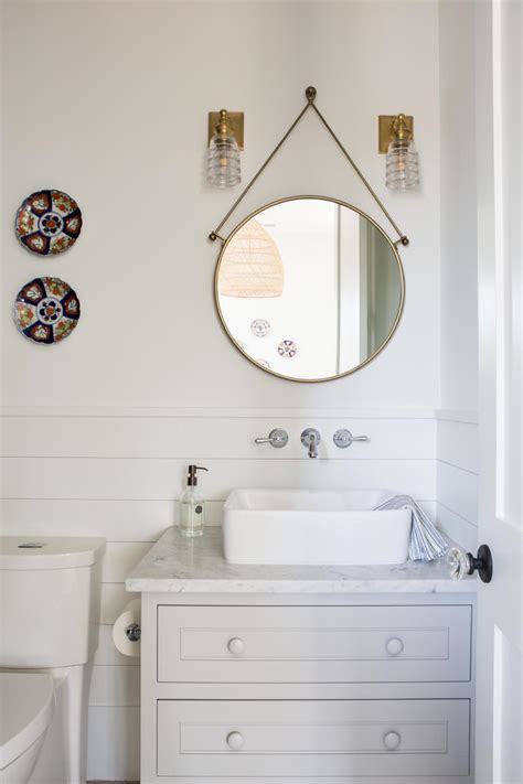 Modern White Cottage Bathroom With Antique Details And Marble Topped