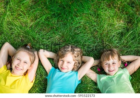 Group Happy Children Playing Outdoors Kids Stockfoto 591522173