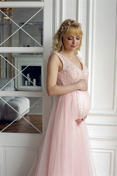 Portrait Of A Pregnant Blonde Woman With Long Hair Photograph By Elena