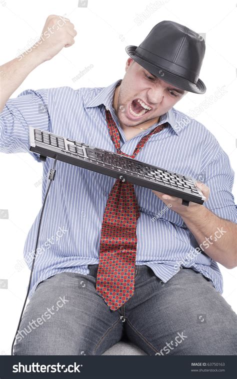 Mad And Angry Man Destroying The The Keyboard Stock Photo 63750163